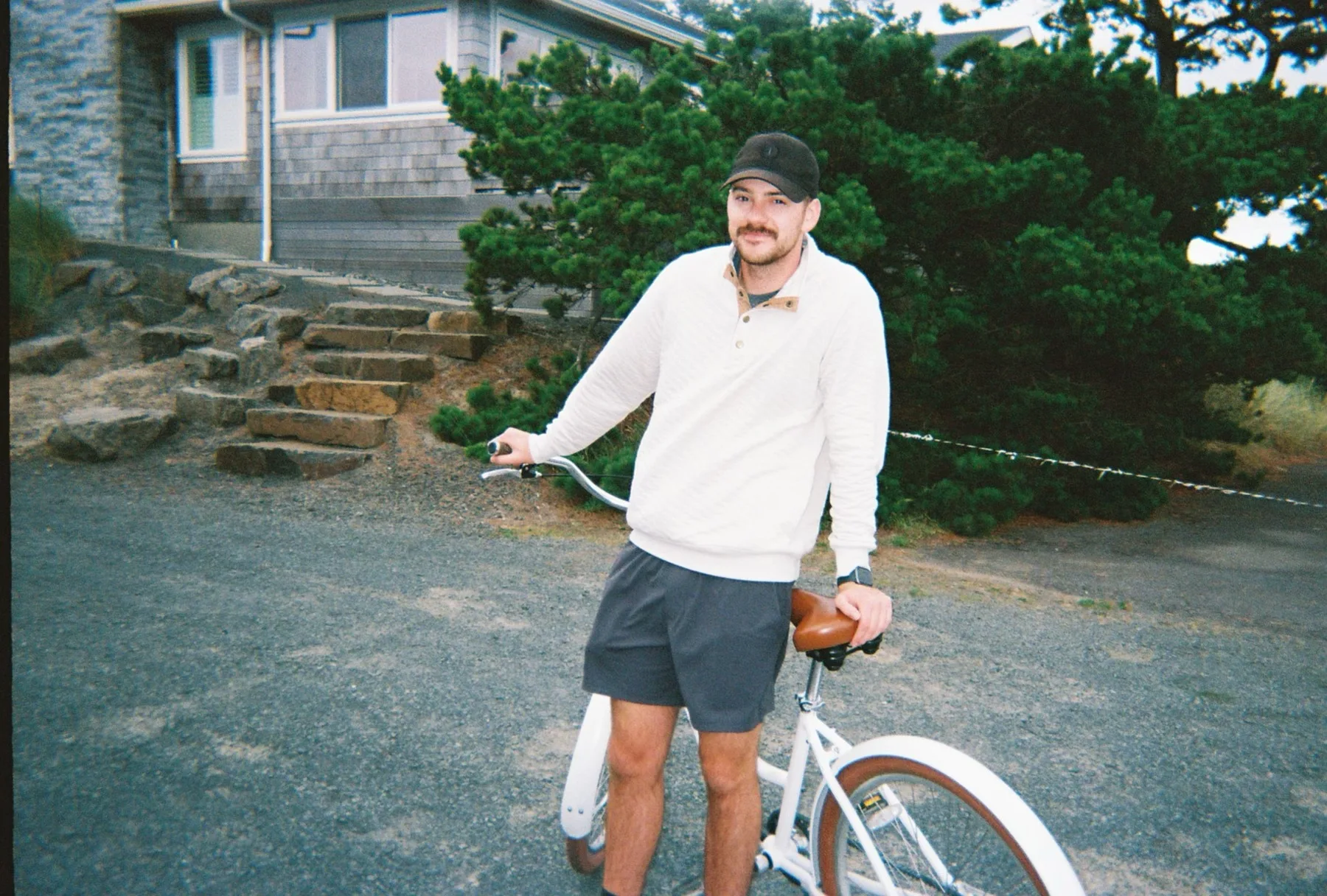 Joseph Suchan standing with a bicycle